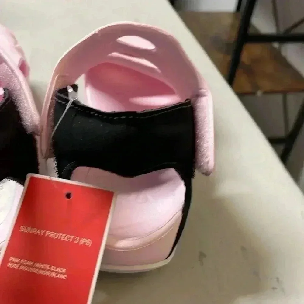 Girls pink Nike shoes